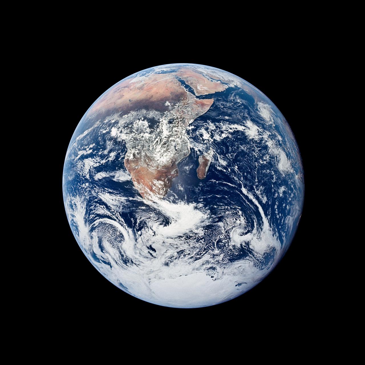 Earth, a blue world with white clouds and the continents of Africa and Europe