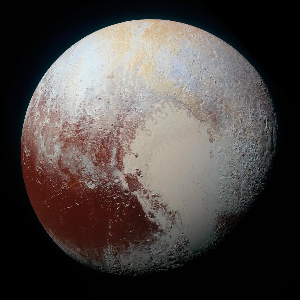 Pluto, a round world with a bright heart-shaped plain
